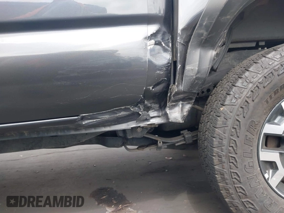 2023 Toyota Tacoma SR with VIN 3TMCZ5AN0PM635933, listed as a IAAI auction lot 42543126 with 32,960 mi miles and . Bid and sale history available at DreamBid. Image 18.
