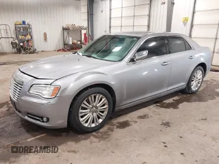 2013 Chrysler 300 with VIN 2C3CCAKT6DH645307, listed as a IAAI auction lot 41512163 with 154,225 mi miles. Bid and sale history available at carsss.com. Image 2.