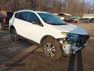 2017 Toyota RAV4 LE with VIN JTMZFREV7HJ120317, listed as a IAAI auction lot 41166489 with 144,799 mi miles and . Bid and sale history available at carsss.com. Image 1.