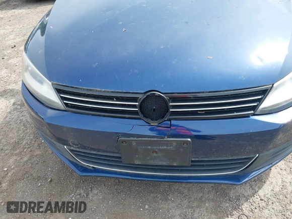 2013 Volkswagen Jetta SE z VIN 3VWDP7AJ0DM292598, wystawiony jako IAAI lot #42360798 z przebiegiem 169 885 mil mil oraz . Historia ofert i sprzedaży dostępna na DreamBid. Obrazek 14.