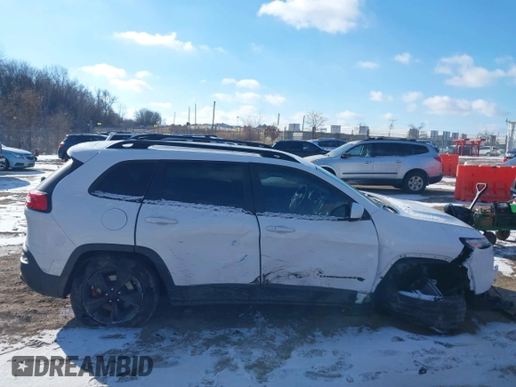 2015 Jeep Cherokee North with VIN 1C4PJMCS7FW792850, listed as a IAAI auction lot 41323432 with 102,642 mi miles. Bid and sale history available at carsss.com. Image 13.