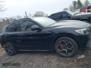 2023 Alfa Romeo Stelvio Ti with VIN ZASPAKBN6P7D56722, listed as a IAAI auction lot 41363962 with 50,073 mi miles. Bid and sale history available at carsss.com. Image 14.