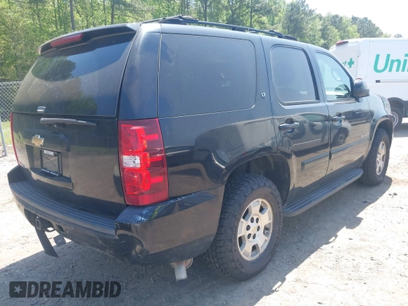 2007 Chevrolet Tahoe LS with VIN 1GNFC13J97R289128, listed as a IAAI auction lot 42071545 with 207,971 mi miles and . Bid and sale history available at DreamBid. Image 4.