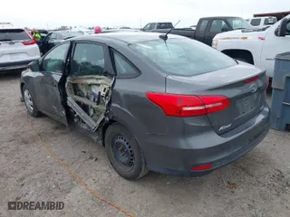 2016 Ford Focus S with VIN 1FADP3E21GL249480, listed as a IAAI auction lot 41747266 with 120,665 mi miles. Bid and sale history available at carsss.com. Image 3.