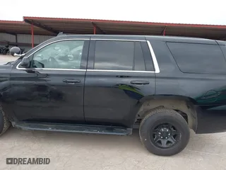 2019 Chevrolet Tahoe Commercial with VIN 1GNLCDECXKR231072, listed as a IAAI auction lot 41800007 with 100,101 mi miles. Bid and sale history available at carsss.com. Image 14.