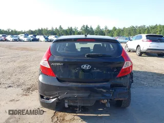 2013 Hyundai Accent GS with VIN KMHCT5AE7DU083576, listed as a IAAI auction lot 42693108 with 100,741 mi miles and . Bid and sale history available at DreamBid. Image 13.