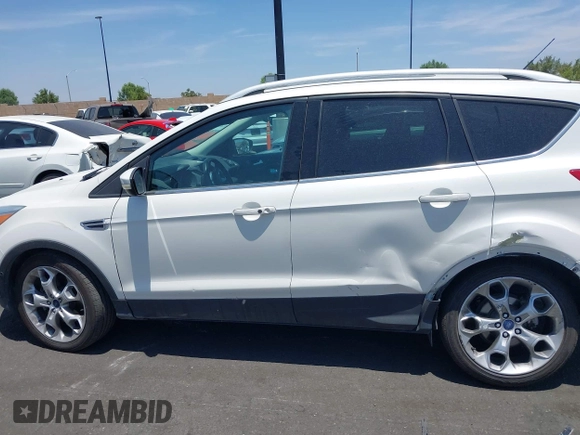 2015 Ford Escape Titanium с VIN 1FMCU0J92FUB25268, выставлен на аукционе IAAI как лот 42489681 с пробегом 139 809 миль миль и . История ставок и продаж доступна на DreamBid. Изображение 14.