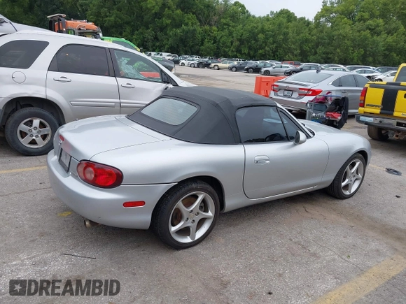 2002 Mazda MX-5 Miata Cloth with VIN JM1NB353820229890, listed as a IAAI auction lot 42750045 with 116,227 mi miles and . Bid and sale history available at DreamBid. Image 4.