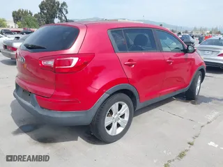 2013 Kia Sportage LX with VIN KNDPBCA26D7355889, listed as a IAAI auction lot 42054415 with 136,859 mi miles. Bid and sale history available at carsss.com. Image 4.