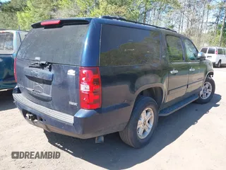 2008 Chevrolet Suburban LT w/3LT with VIN 1GNFK16368J138876, listed as a IAAI auction lot 42039588 with 318,374 mi miles. Bid and sale history available at carsss.com. Image 4.