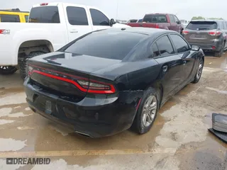 2017 Dodge Charger SE with VIN 2C3CDXBG1HH546208, listed as a IAAI auction lot 42047013 with 221,716 mi miles. Bid and sale history available at carsss.com. Image 4.