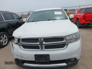 2013 Dodge Durango SXT z VIN 1C4RDHAG4DC598250, wystawiony jako IAAI lot #42076002 z przebiegiem 104 701 mil mil oraz . Historia ofert i sprzedaży dostępna na DreamBid. Obrazek 12.