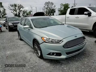 2013 Ford Fusion SE Hybrid z VIN 3FA6P0LU6DR174719, wystawiony jako Copart lot #62877715 z przebiegiem 52 884 mil mil oraz Szkoda całkowita • Salvage title. Historia ofert i sprzedaży dostępna na DreamBid. Obrazek 14.