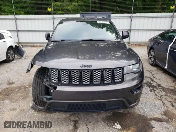 2018 Jeep Grand Cherokee Altitude with VIN 1C4RJEAG0JC208506, listed as a Copart auction lot 52669915 with 159,299 mi miles and Salvage title. Bid and sale history available at DreamBid. Image 5.