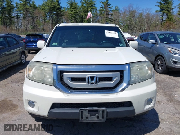 2011 Honda Pilot Touring with VIN 5FNYF4H98BB087713, listed as a IAAI auction lot 42132764 with 250,507 mi miles. Bid and sale history available at carsss.com. Image 13.