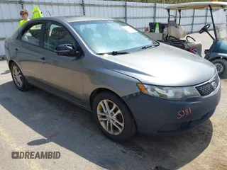 2011 Kia Forte EX with VIN KNAFU4A22B5405396, listed as a IAAI auction lot 42125381 with 209,300 mi miles. Bid and sale history available at carsss.com. Image 1.