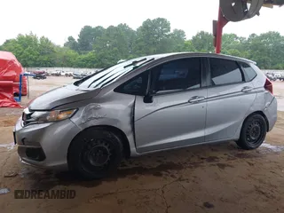 2018 Honda Fit LX with VIN 3HGGK5H4XJM735209, listed as a IAAI auction lot 42348191 with 161,902 mi miles and . Bid and sale history available at DreamBid. Image 6.