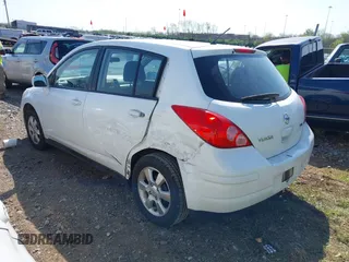 2012 Nissan Versa S with VIN 3N1BC1CPXCK212600, listed as a IAAI auction lot 41918424 with 104,483 mi miles. Bid and sale history available at carsss.com. Image 3.
