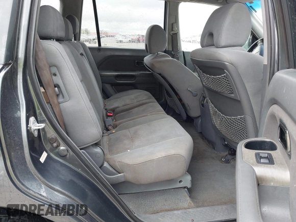 2006 Honda Pilot EX with VIN 5FNYF28406B047964, listed as a IAAI auction lot 41898134 with 217,877 mi miles and . Bid and sale history available at DreamBid. Image 8.