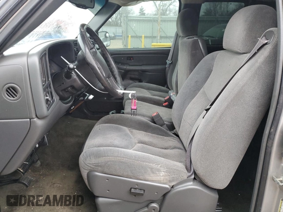 2005 Chevrolet Silverado 1500 LS with VIN 2GCEC19TX51207426, listed as a Copart auction lot 44393255 with 259,005 mi miles and Salvage Title. Bid and sale history available at DreamBid. Image 7.