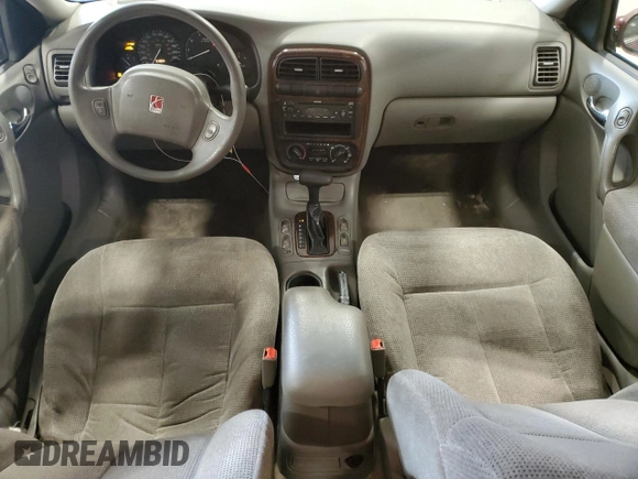 2001 Saturn LS z VIN 1G8JU52F51Y549021, wystawiony jako Copart lot #81109084 z przebiegiem 14 974 mil mil oraz Tytuł czysty. Historia ofert i sprzedaży dostępna na DreamBid. Obrazek 8.
