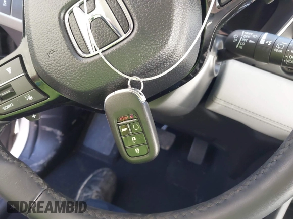 2024 Honda Pilot Touring with VIN 5FNYG2H7XRB016877, listed as a IAAI auction lot 41496013 with 18,213 mi miles and . Bid and sale history available at DreamBid. Image 11.