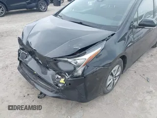 2017 Toyota Prius Two with VIN JTDKARFUXH3041931, listed as a IAAI auction lot 42075004 with 75,768 mi miles and . Bid and sale history available at DreamBid. Image 6.