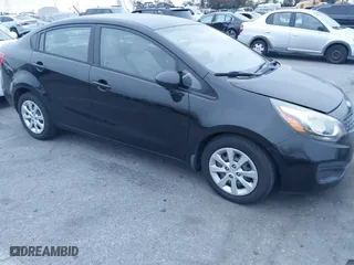 2013 Kia Rio LX with VIN KNADM4A39D6238015, listed as a IAAI auction lot 41891736 with 120,519 mi miles. Bid and sale history available at carsss.com. Image 1.