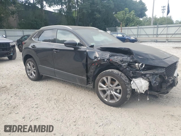 2023 Mazda CX-30 2.5 S Premium Package with VIN 3MVDMBDMXPM501188, listed as a Copart auction lot 64816164 with 0 mi miles and Salvage Title. Bid and sale history available at carsss.com. Image 4.