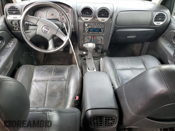 2006 GMC Envoy SLE with VIN 1GKDT13S462228967, listed as a Copart auction lot 73669484 with 233,349 mi miles and Salvage Title. Bid and sale history available at DreamBid. Image 8.