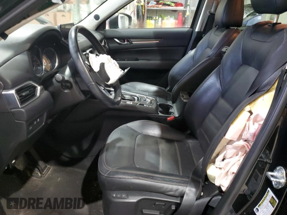 2018 Mazda CX-5 Grand Touring with VIN JM3KFADM3J0325843, listed as a Copart auction lot 87958375 with 93,577 mi miles and Salvage title. Bid and sale history available at DreamBid. Image 7.