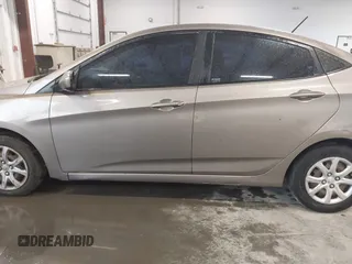 2013 Hyundai Accent GLS with VIN KMHCT4AE2DU486097, listed as a IAAI auction lot 41972806 with 295,949 mi miles. Bid and sale history available at carsss.com. Image 15.
