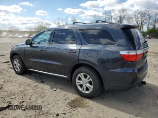 2013 Dodge Durango SXT with VIN 1C4RDJAG0DC693413, listed as a Copart auction lot 51777405 with 160,231 mi miles and Salvage Title. Bid and sale history available at carsss.com. Image 2.
