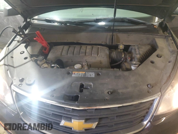 2014 Chevrolet Traverse LS z VIN 1GNKVFKD2EJ313752, wystawiony jako Copart lot #53604005 z przebiegiem 213 362 mil mil oraz Szkoda całkowita • Salvage title. Historia ofert i sprzedaży dostępna na DreamBid. Obrazek 12.