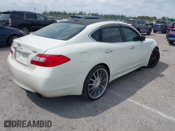 2011 Infiniti M with VIN JN1BY1AP7BM325701, listed as a IAAI auction lot 41861484 with 151,955 mi miles and . Bid and sale history available at DreamBid. Image 4.