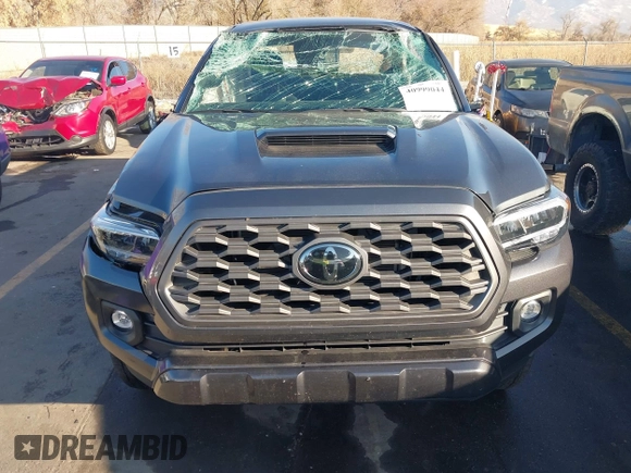 2023 Toyota Tacoma SR with VIN 3TMCZ5AN2PM553928, listed as a IAAI auction lot 40999044 with 9,210 mi miles and . Bid and sale history available at DreamBid. Image 12.