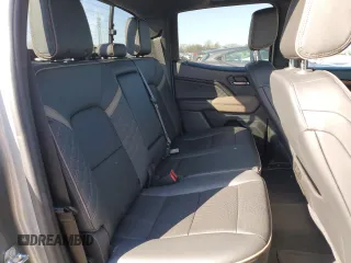 2023 GMC Canyon 4WD Denali with VIN 1GTP6FEK3P1262139, listed as a Copart auction lot 42386625 with 7,442 mi miles and Salvage Title. Bid and sale history available at carsss.com. Image 10.
