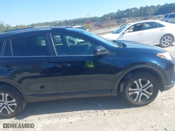 2017 Toyota RAV4 LE with VIN JTMZFREV9HJ719316, listed as a IAAI auction lot 41497253 with 98,357 mi miles. Bid and sale history available at carsss.com. Image 13.
