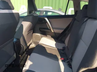 2014 Toyota RAV4 LE z VIN JTMZFREV9E5018084, wystawiony jako IAAI lot #42573040 z przebiegiem 168 661 mil mil oraz . Historia ofert i sprzedaży dostępna na DreamBid. Obrazek 8.