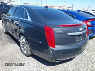 2016 Cadillac XTS Luxury Collection with VIN 2G61N5S32G9208717, listed as a IAAI auction lot 41197011 with 63,545 mi miles and . Bid and sale history available at carsss.com. Image 3.