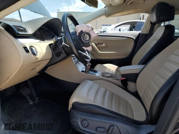 2014 Volkswagen CC R-Line with VIN WVWBP7AN0EE524850, listed as a Copart auction lot 52026104 with 92,196 mi miles and Salvage Title. Bid and sale history available at carsss.com. Image 7.