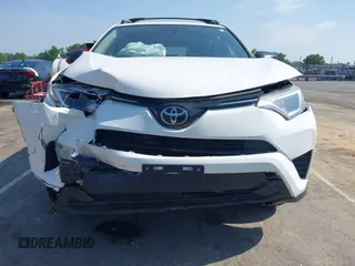 2017 Toyota RAV4 LE with VIN JTMBFREV8HJ157555, listed as a IAAI auction lot 42147300 with 81,187 mi miles and . Bid and sale history available at DreamBid. Image 12.