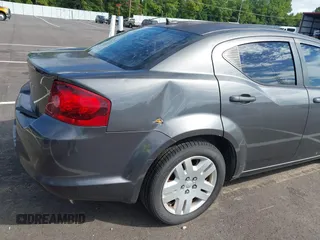 2014 Dodge Avenger SE with VIN 1C3CDZAB3EN219717, listed as a IAAI auction lot 42737543 with 157,362 mi miles and . Bid and sale history available at DreamBid. Image 6.