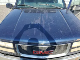 1995 GMC Sierra 1500 z VIN 2GTEK19K3S1591653, wystawiony jako Copart lot #75799124 z przebiegiem 329 311 mil mil oraz Nie do naprawy. Historia ofert i sprzedaży dostępna na DreamBid. Obrazek 11.
