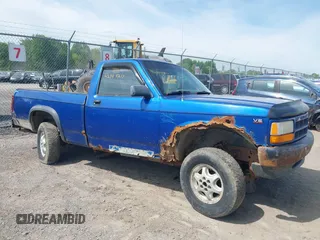 1994 Dodge Dakota z VIN 1B7GG26X5RW145863, wystawiony jako IAAI lot #42345217 z przebiegiem 117 441 mil mil oraz . Historia ofert i sprzedaży dostępna na DreamBid. Obrazek 1.