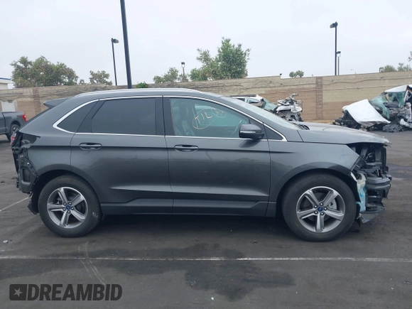 2019 Ford Edge SEL with VIN 2FMPK3J94KBC48742, listed as a IAAI auction lot 42393919 with 68,564 mi miles and . Bid and sale history available at DreamBid. Image 14.