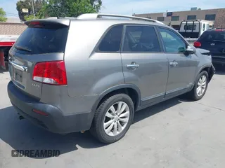 2011 Kia Sorento EX with VIN 5XYKUDA29BG055919, listed as a IAAI auction lot 42105406 with 146,302 mi miles. Bid and sale history available at carsss.com. Image 4.