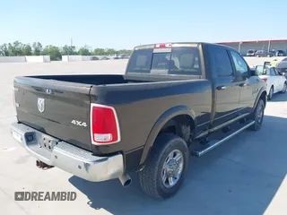 2013 Ram 2500 Laramie with VIN 3C6UR5FL7DG529590, listed as a IAAI auction lot 40608177 with 141,594 mi miles. Bid and sale history available at carsss.com. Image 4.