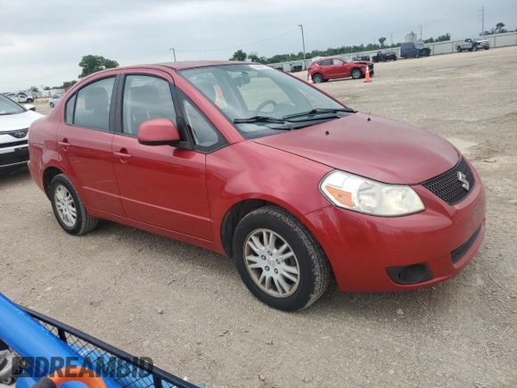 2012 Suzuki SX4 LE z VIN JS2YC5A33C6304897, wystawiony jako Copart lot #55567505 z przebiegiem 42 968 mil mil oraz Szkoda całkowita • Salvage title. Historia ofert i sprzedaży dostępna na DreamBid. Obrazek 4.
