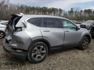 2018 Honda CR-V EX with VIN 2HKRW2H59JH635143, listed as a Copart auction lot 50819535 with 20,953 mi miles and Salvage Title. Bid and sale history available at DreamBid. Image 3.